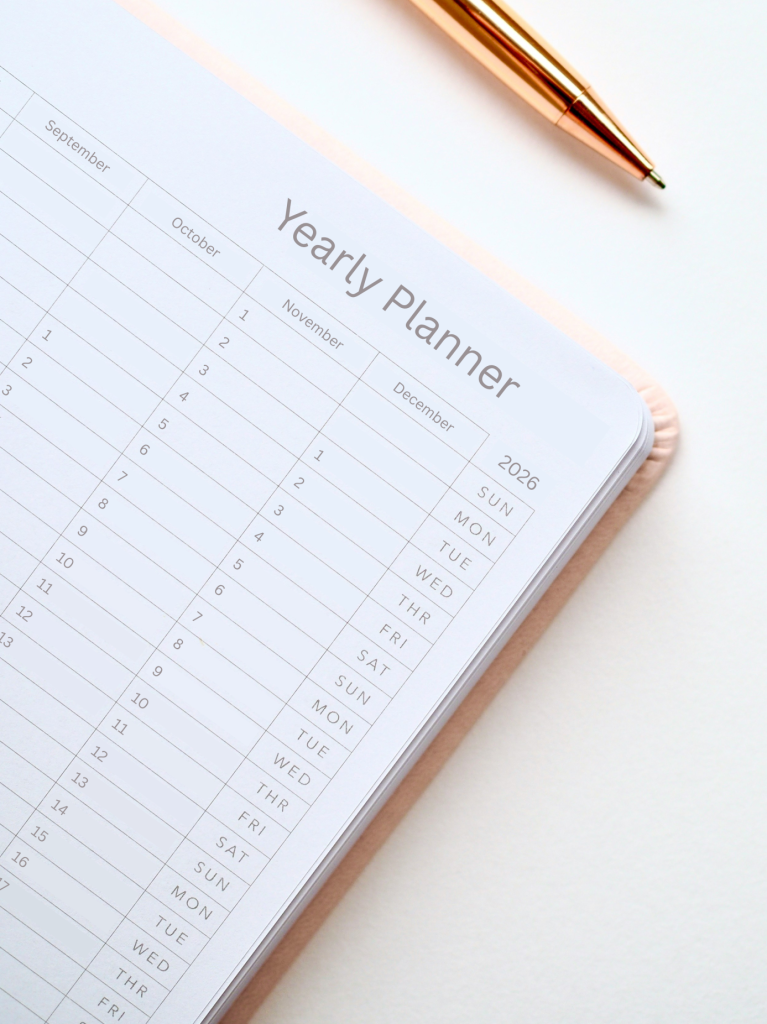 Pen with a calendar book showing Q4